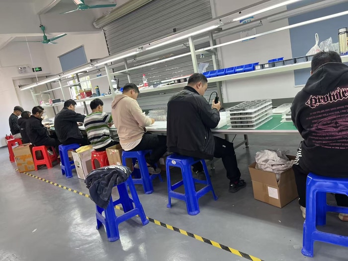 JetKVM parts laid out together during early assembly.